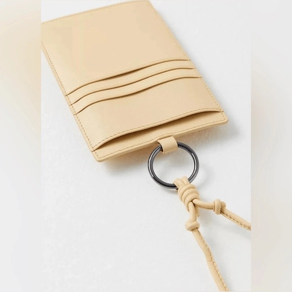 Free People Accessories - NWT FLAWED Free People Sun's Out Downtown Leather  Crossbody Wallet Banana Cream